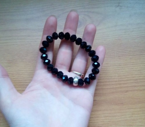 Pretty black glass bead white - pretty,